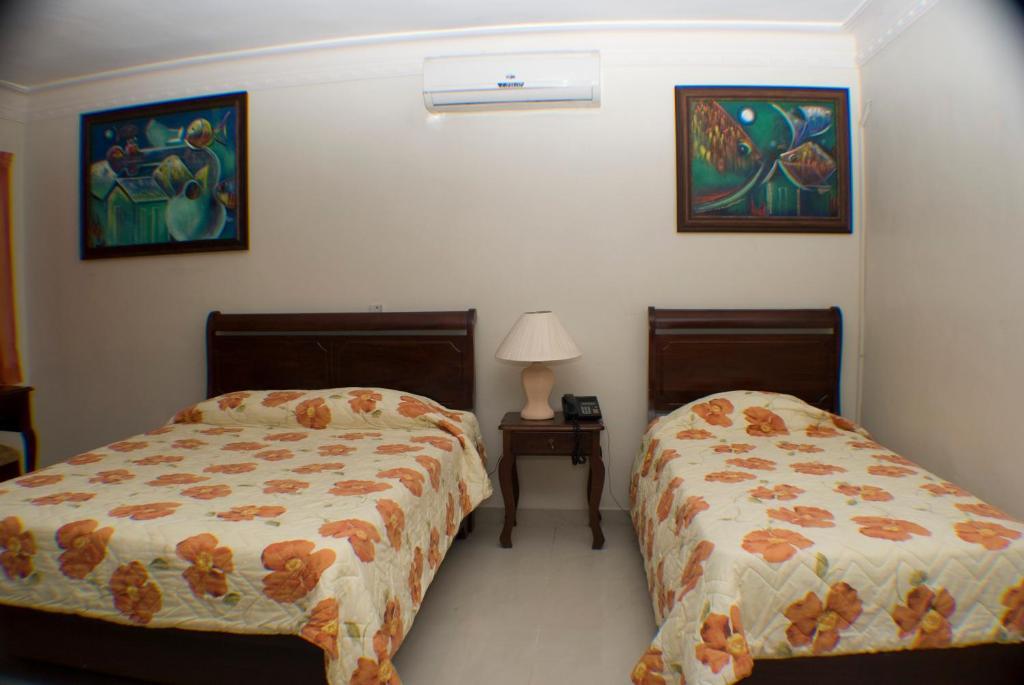 Hotel Luis V Санто-Доминго Номер фото